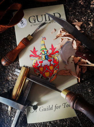Tools arranged on a guild document